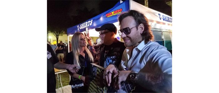 ARTIST STICKMAN CAPTURES THE PRESS AND CAPTIVATES MUSIC LOVING FANS IN SOUTH FLORIDA WITH HIS NEWLY RICK NIELSEN SIGNED ARTWORK “DIDN’T I DIDN’T I DIDN’T I”